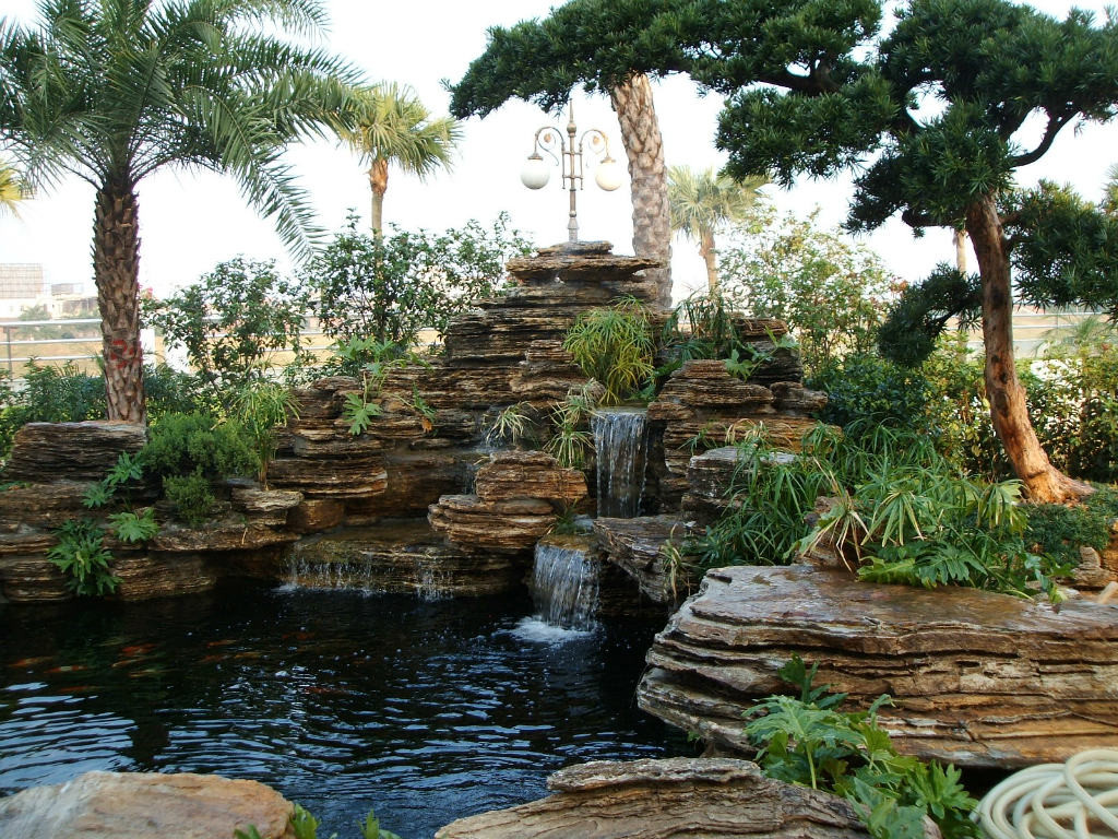 庭院千層石流水魚池假山制作